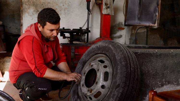 Mechanic working in automative shop in Albania
