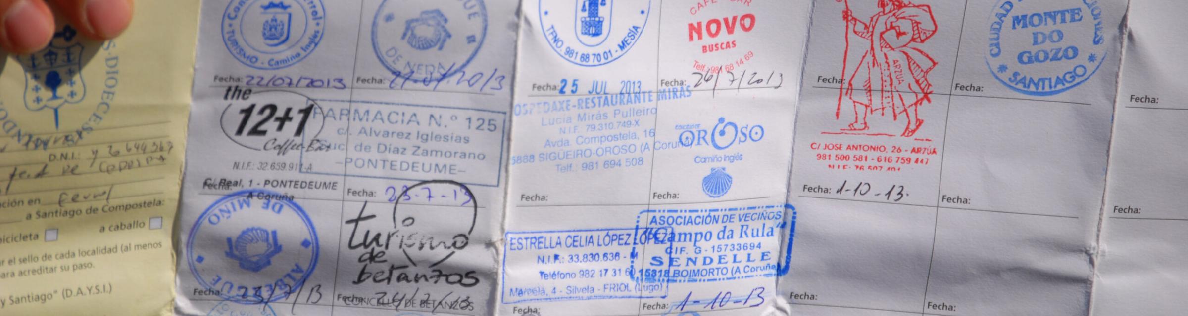 Stamps in your passport show your progress on the Camino de Santiago as you share the Good News with pilgrims.  
Photo by Julia