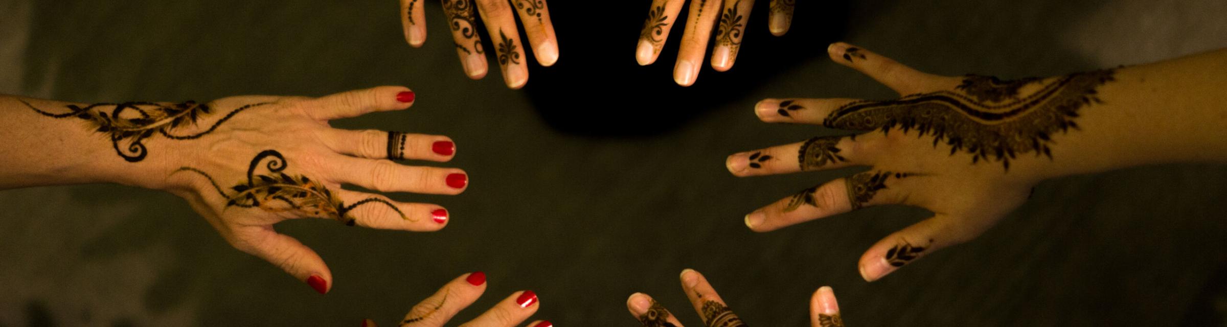 Henna designs provide artistic inspiration and the application provides quality time among women in the Arabian Peninsula.  
Photo by Andrew W.