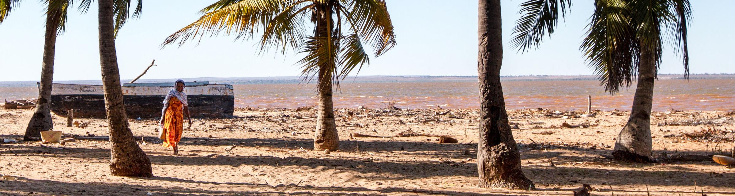 A woman walks along the beach in northern Madagascar. Photo by Rebecca Rempel.