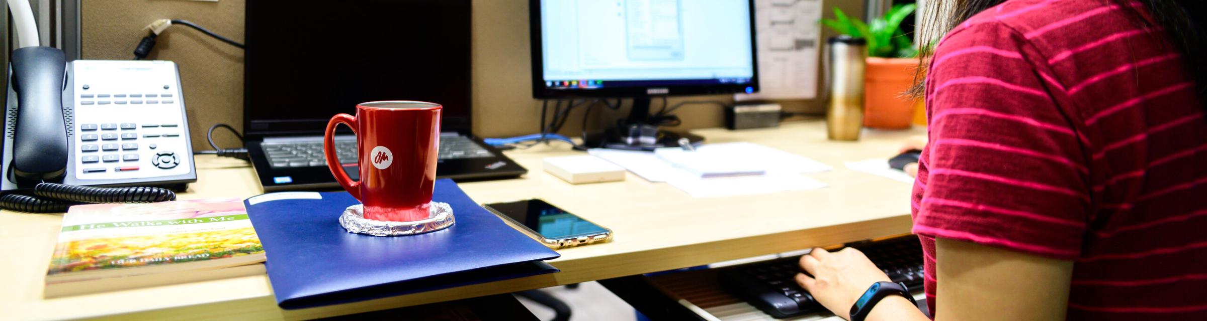 Office worker working away in the office.