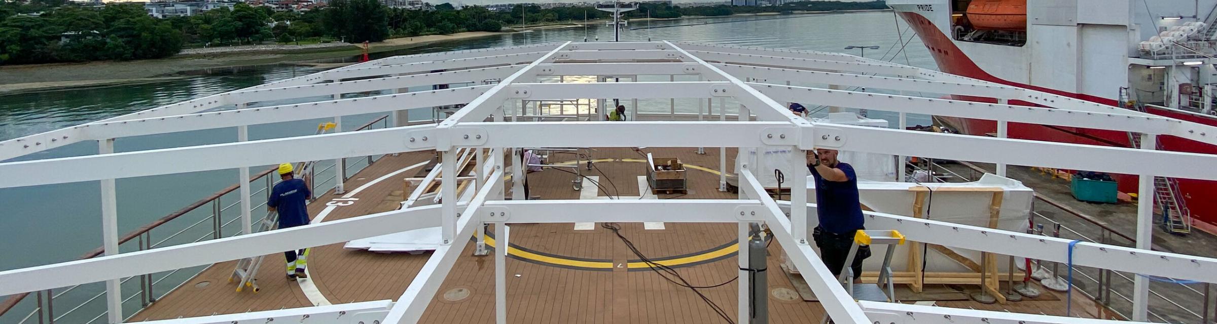 Singapore :: Doulos Hope's bookfair canopy is constructed on the top deck