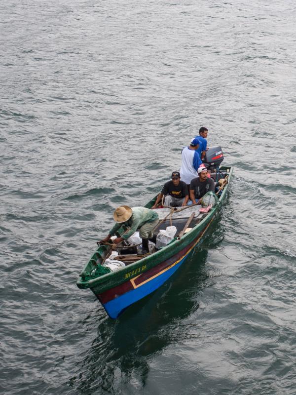 fishermen on boat in El Salvador
