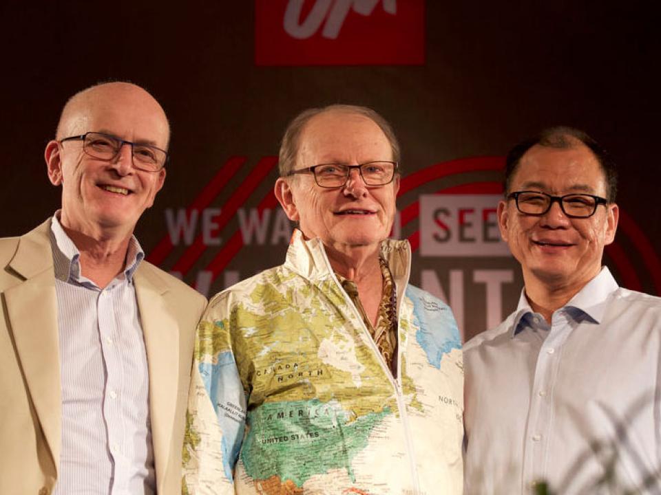 Portrait of three international leaders of OM