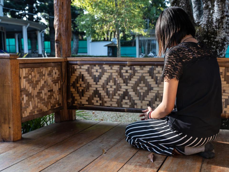 Young woman praying