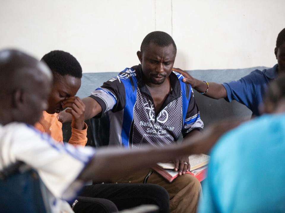 Team praying at the school for the disabled in Zambia