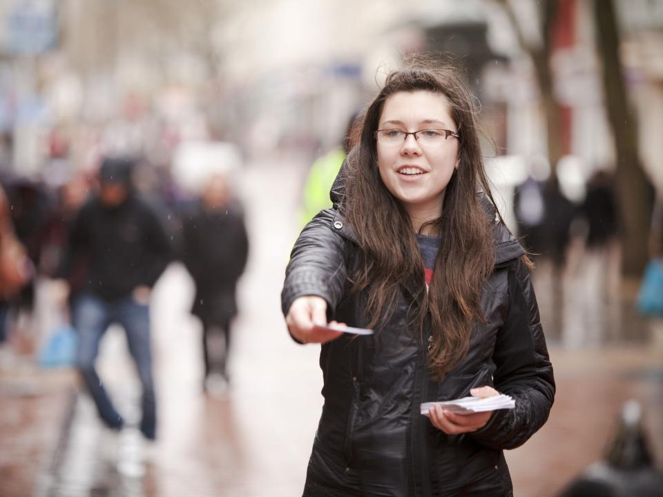 Canadian youth hand out Christian literature in Birmingham city centre during an open-air outreach. The team from Oakville, Ontario were in Birmingham for a one week mission trip involving a variety of opportunities to share the gospel.