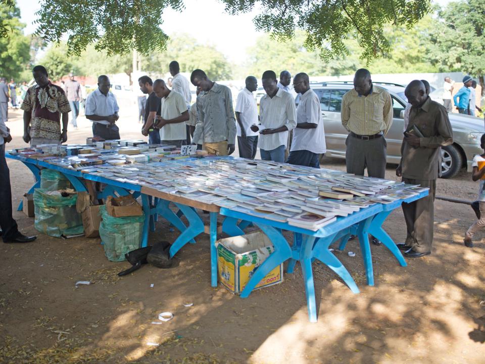 OM South Sudan sells Christian books at book tables at churches and special events.  
Photo by Justin Lovett