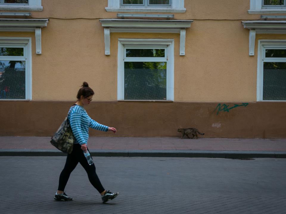A young woman walking in downtown Odessa. Photo by Garrett N