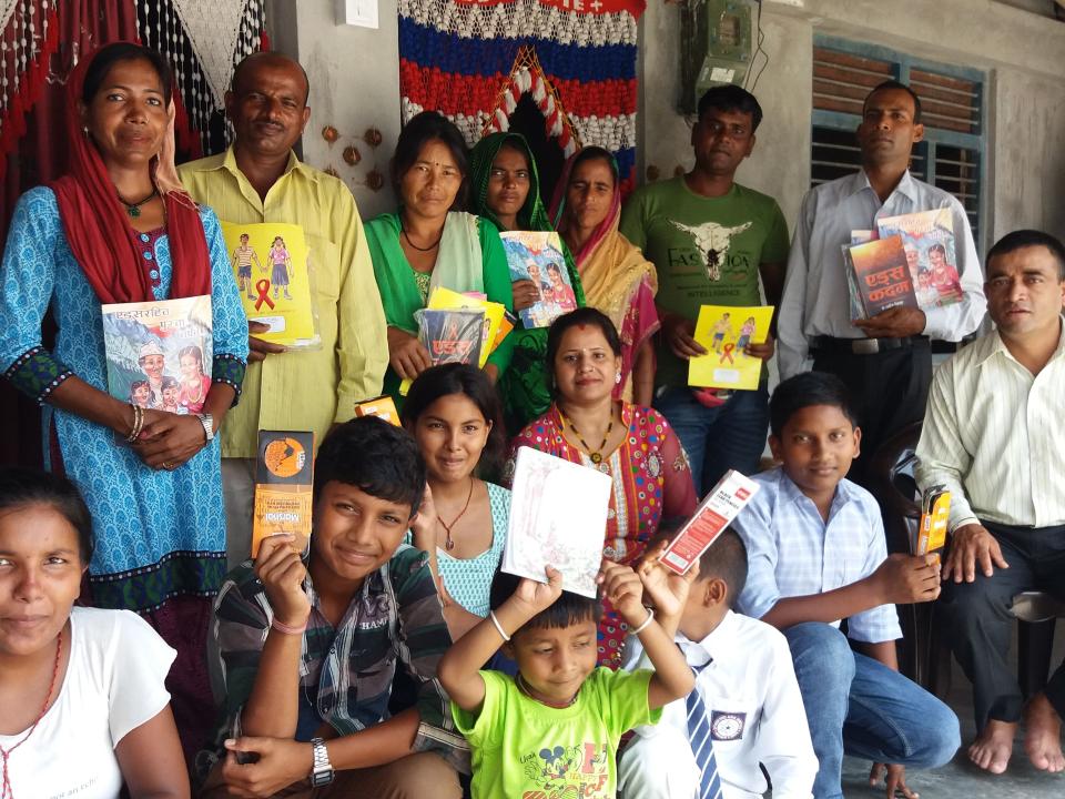AIDSLink worker and participants at a HIV/AIDS Awareness and Fellowship programme