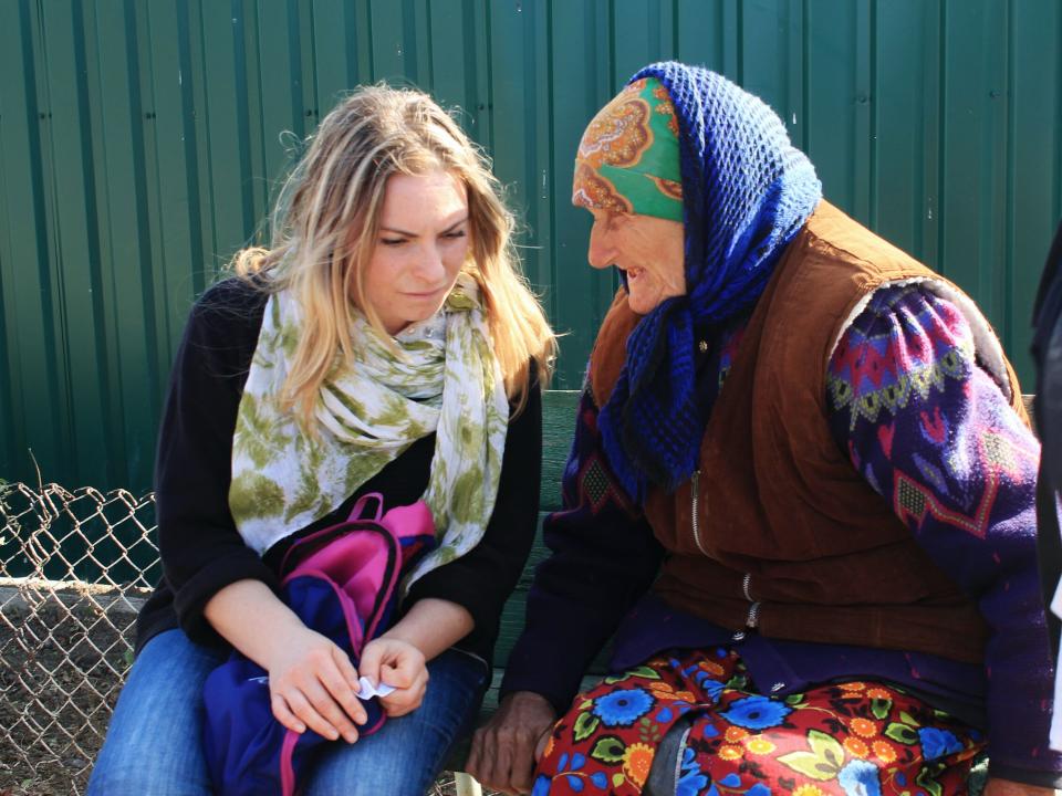 A Moldovan OM worker speaks to an old lady during an outreach that was part of OM Moldova’s “Challenge into Missions” programme. This 10-week training course offers young Moldovans their first experience of missions.
