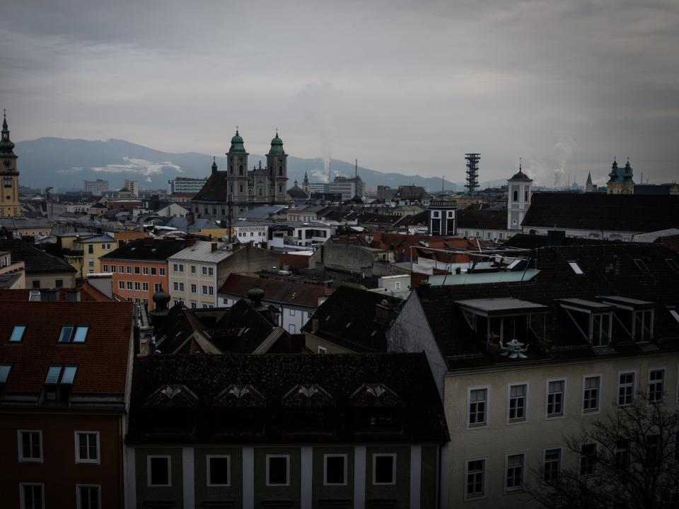 Overlooking the town of Linz in Austria: the centre with  several churches.