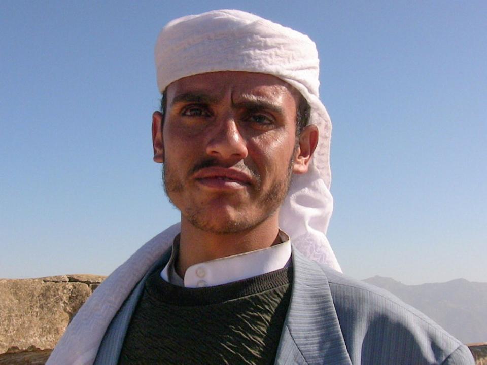 Man in Yemen wearing a traditional headdress.