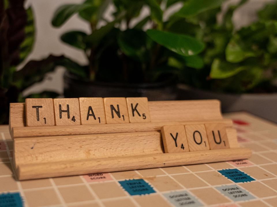 "Thank You" spelt out in Scrabble tiles. Photo by Rebecca Rempel.