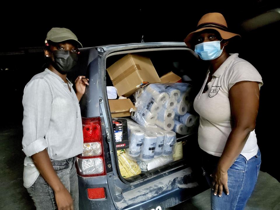 Distributing aid after the volcano eruption on the Caribbean island of Saint Vincent.