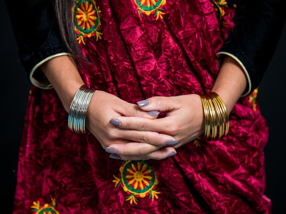 A woman from South Asia wears a traditional outfit from her country. Photo by Jun Han.