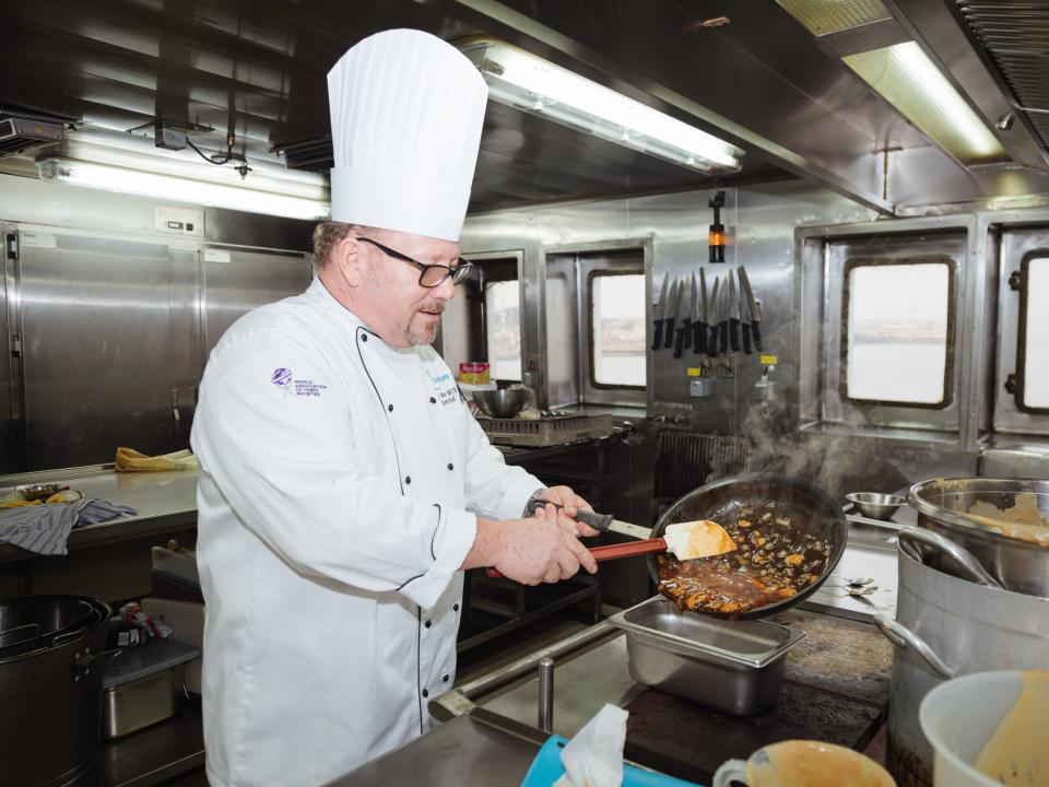 Tema, Ghana :: Andy West (USA) serves on board Logos Hope as chief cook.