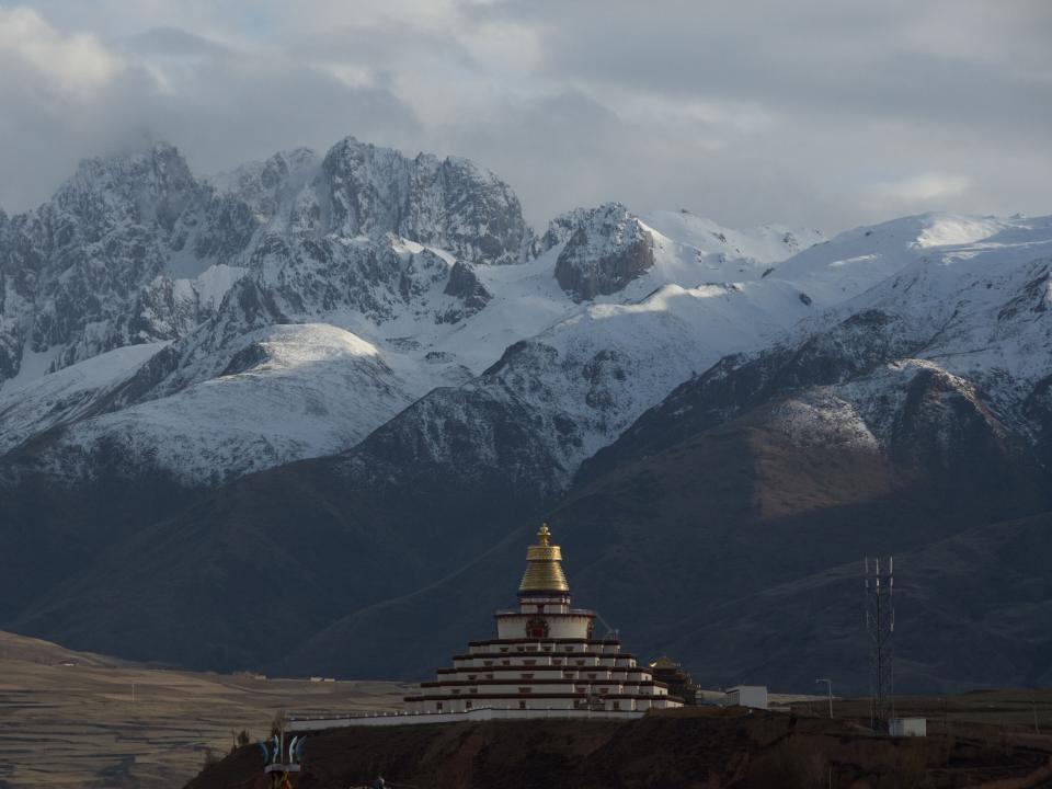 Stupas like this one are built across the Himalayan range. They are a religious mound-like structure with relics written on them and a common part of Tibetan Buddhism. Photo by Ellyn Schellenberg.
