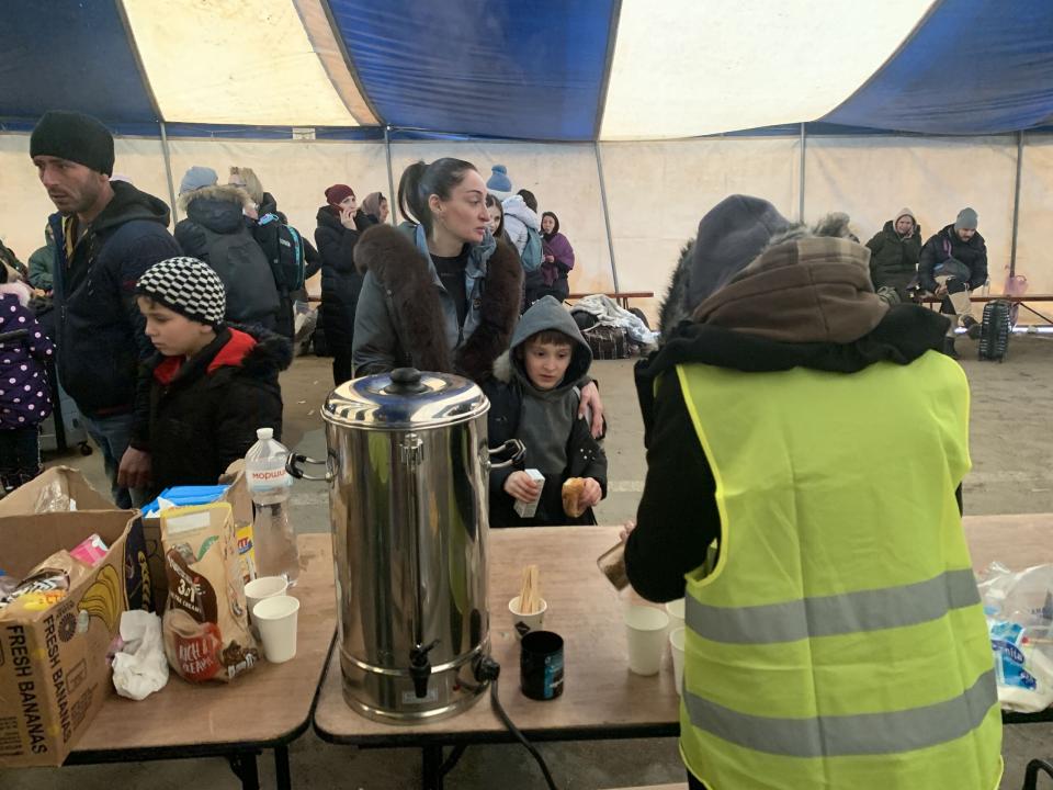 As people wait to leave Ukraine and enter Moldova, they pass through an OM tent where food, hot beverages and shelter are provided. The local church continues to cook hot meals for people in this immigration line and OM workers serve in the tent 24/7. Pho