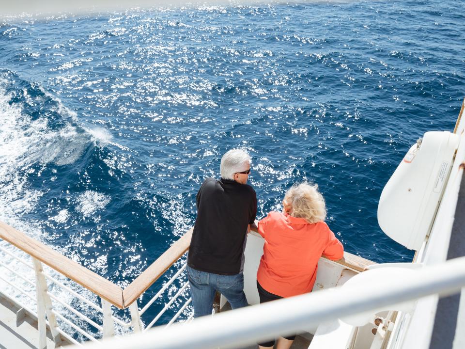 At Sea :: Crewmembers enjoying the fresh air durining the voyage to Las Palmas.