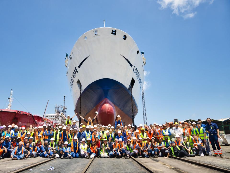 Las Palmas, Canary Islands :: The ship's technical team pose for the annual dry dock picture before the ship is refloated.