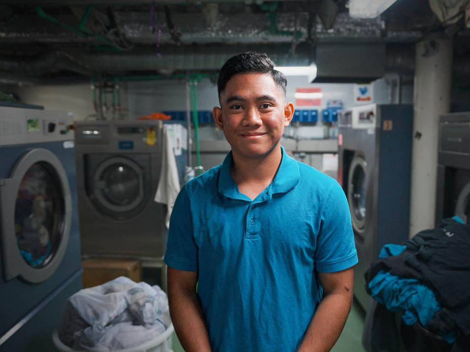 Vlorë, Albania :: Wise (Indonesia) stops for a photo during his working day as part of the accommodation services team on board Logos Hope