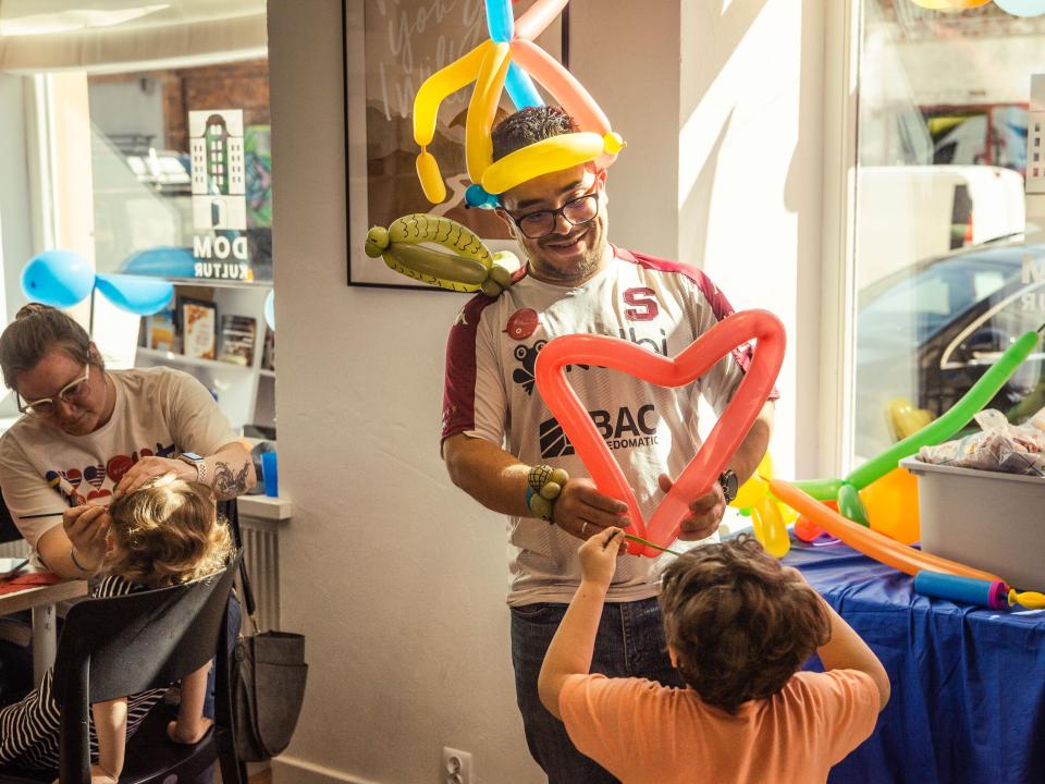 Celebrating children's day with games, balloons, face painting, and much more! Photo by Piotr Baczewski