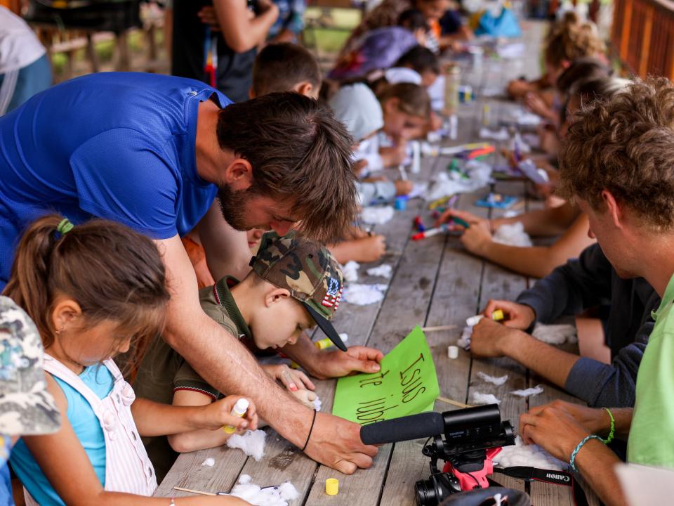 A short term team helps children during craft time. Photo by Jordan Wilkinson.