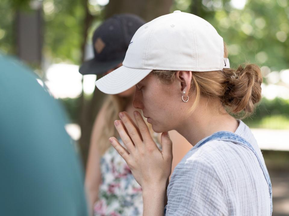 Prayer for the community. Photo by Achim Schneider.