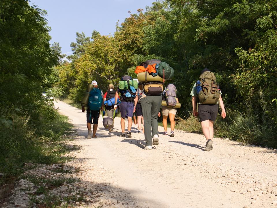 A short-term team walks during a Love Moldova trekking outreach.