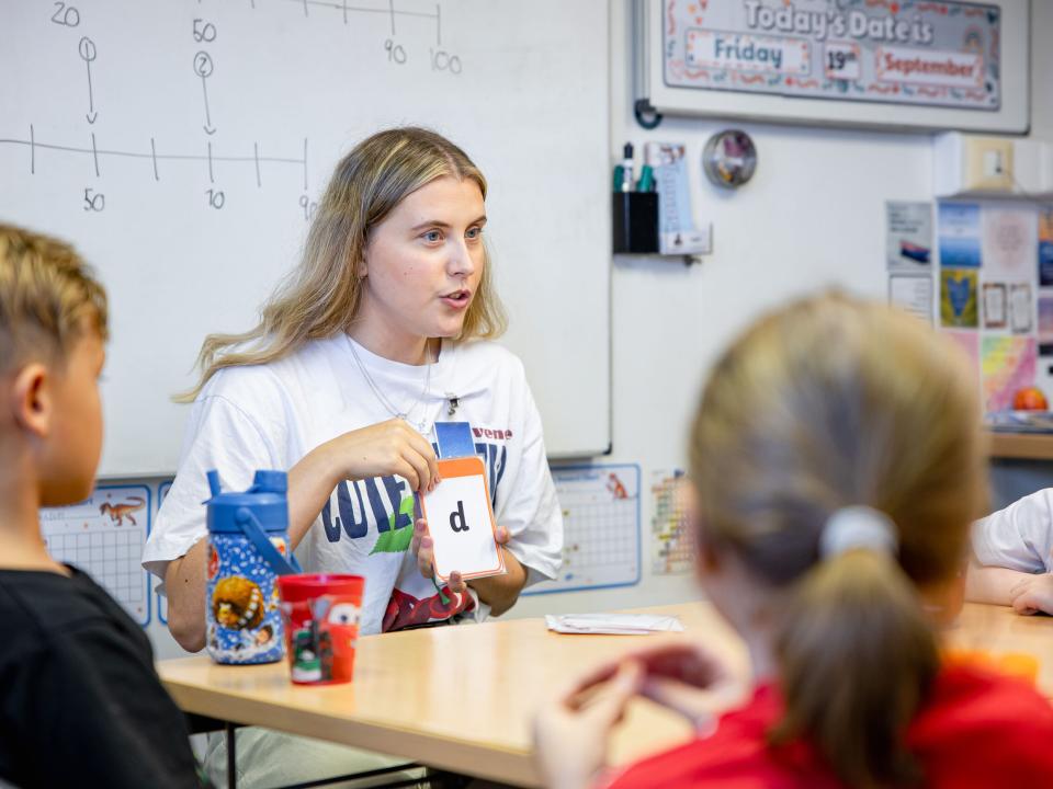 Freeport, Bahamas :: Emily (UK) teaching pronunciation to children in the ship's school. 