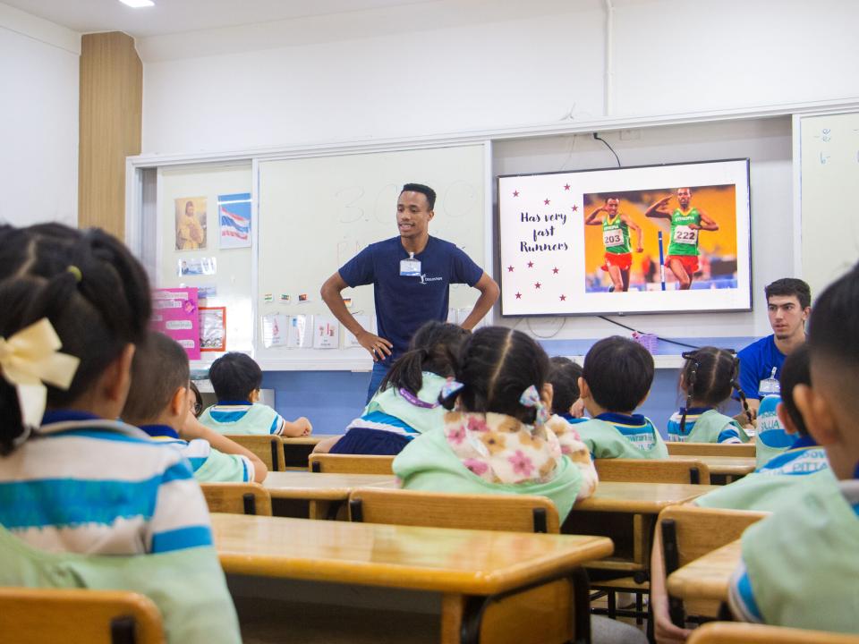 Bangkok, Thailand :: Tinsae (Ethiopia) introduces his culture to the students from the local kindergarten school.