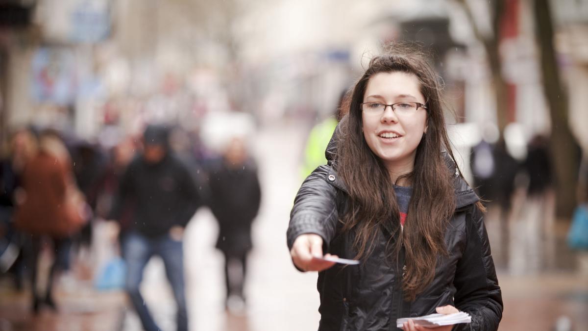 Canadian youth hand out Christian literature in Birmingham city centre during an open-air outreach. The team from Oakville, Ontario were in Birmingham for a one week mission trip involving a variety of opportunities to share the gospel.