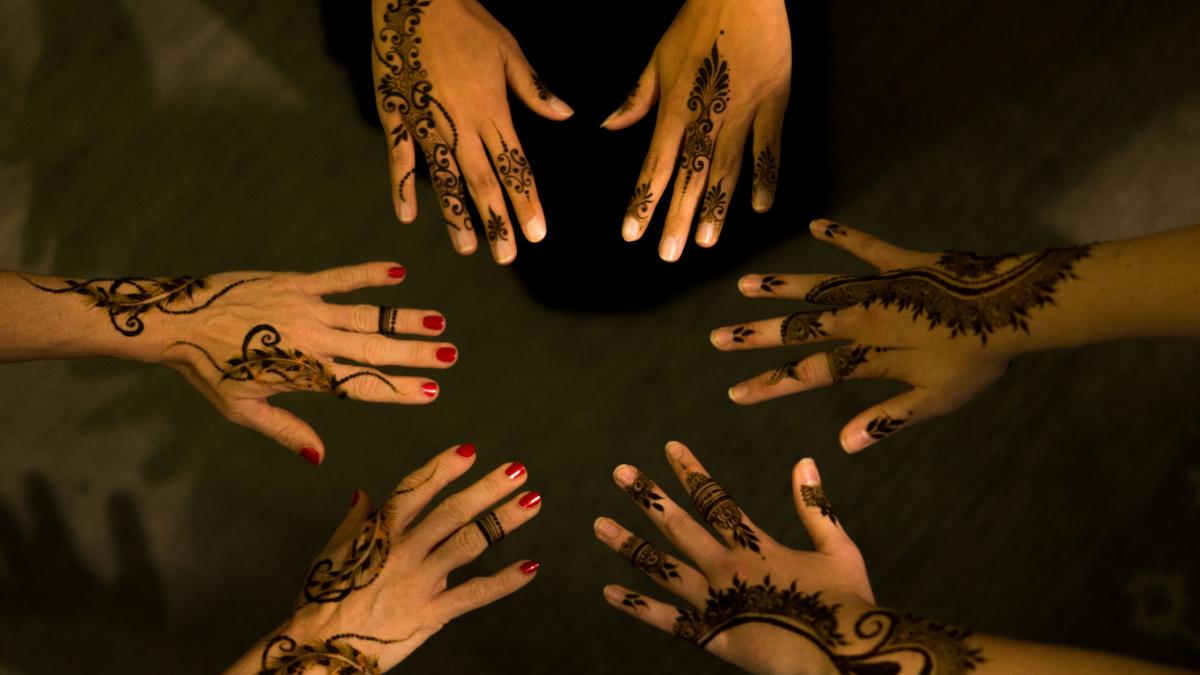 Henna designs provide artistic inspiration and the application provides quality time among women in the Arabian Peninsula.  
Photo by Andrew W.