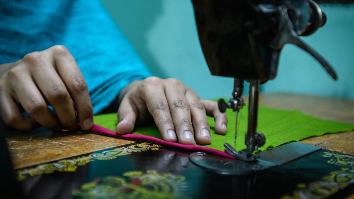 Young women living in a slum in Bangladesh have the opportunity to learn a technical skill like sewing, enabling them to earn a living.  Photo by Garrett N