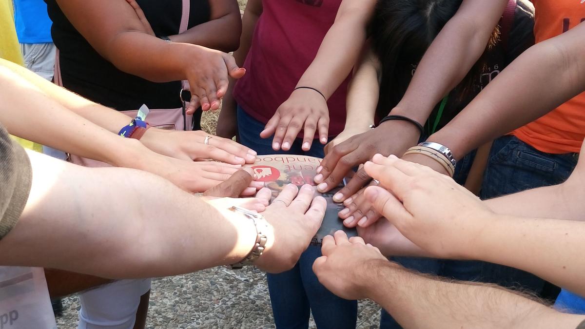 Hands joined in prayer at Transform 2018.