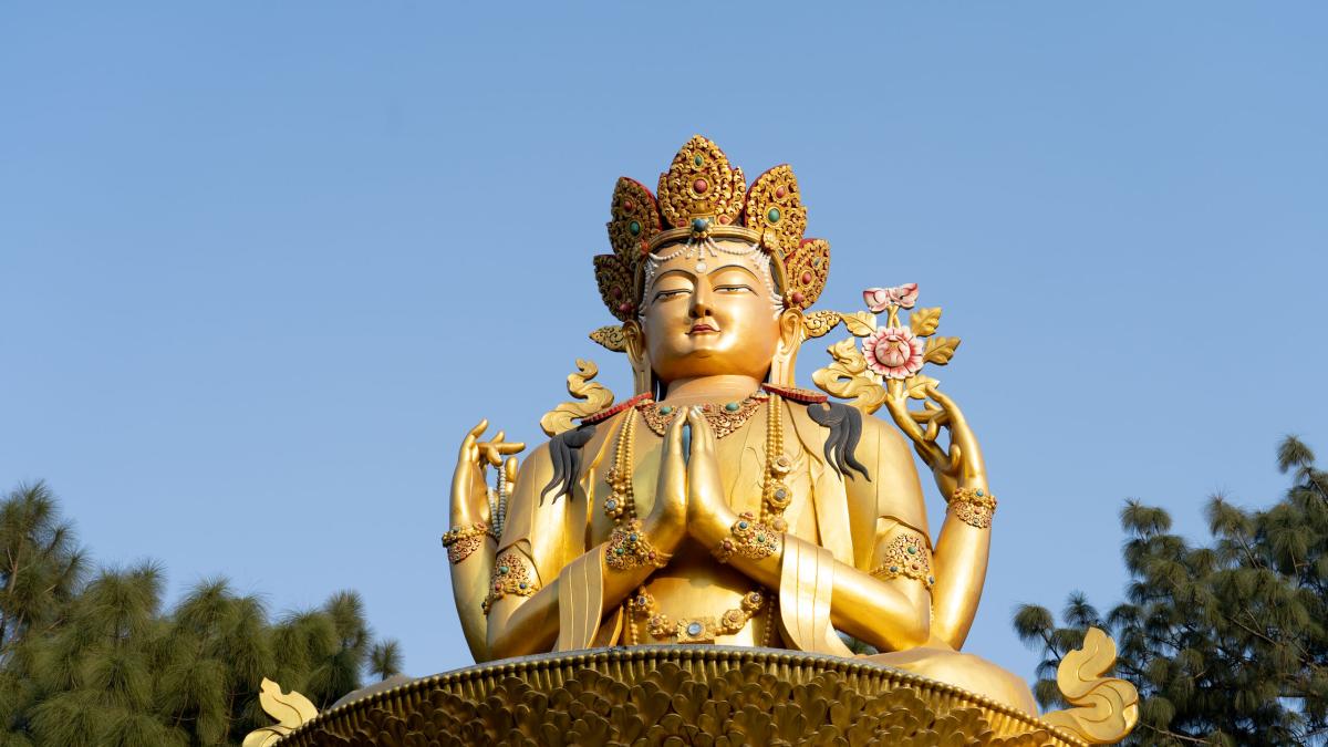 Statue outside of a Buddhist temple in South Asia. Photo by Rebecca Rempel.
