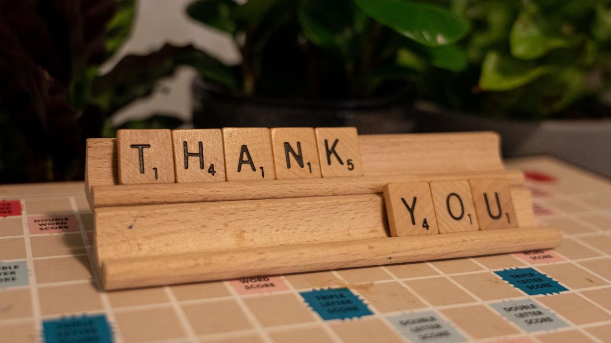 "Thank You" spelt out in Scrabble tiles. Photo by Rebecca Rempel.