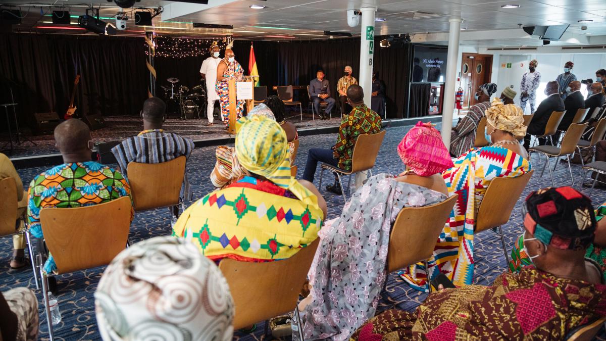 Tema, Ghana :: Royal guests listen to Nii Ahele Nunoo III as he addresses the crowd