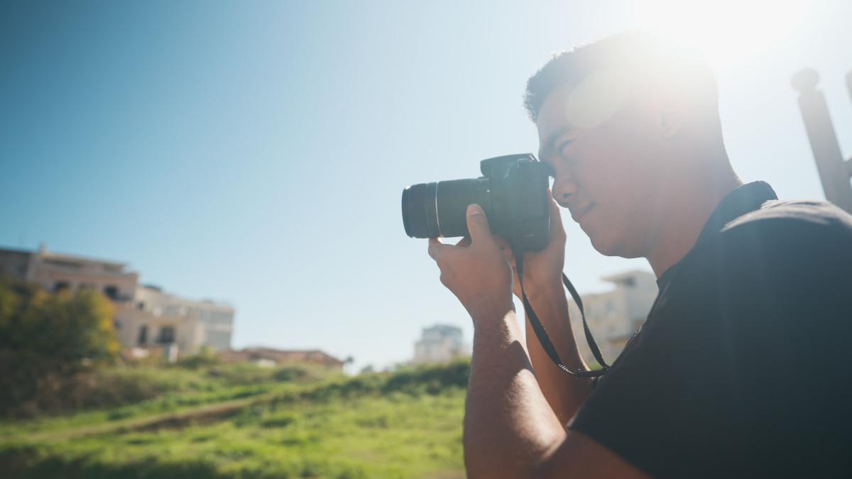 Vlorë, Albania :: Wise (Indonesia) looks through the lens of his camera during a day exploring in Albania
