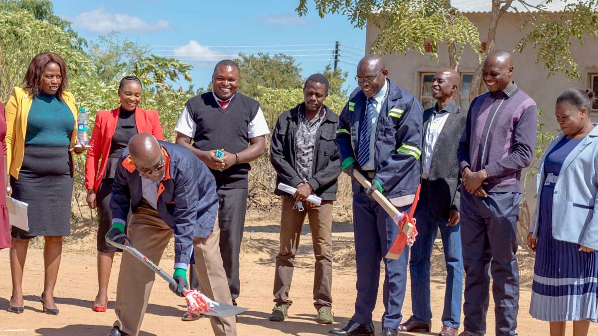 Breaking ground for a protective wall at Makwati School in Zambia, built and run by OM in Zambia. The wall will protect the school from theft and vandalism, while also allowing the school to keep small livestock.