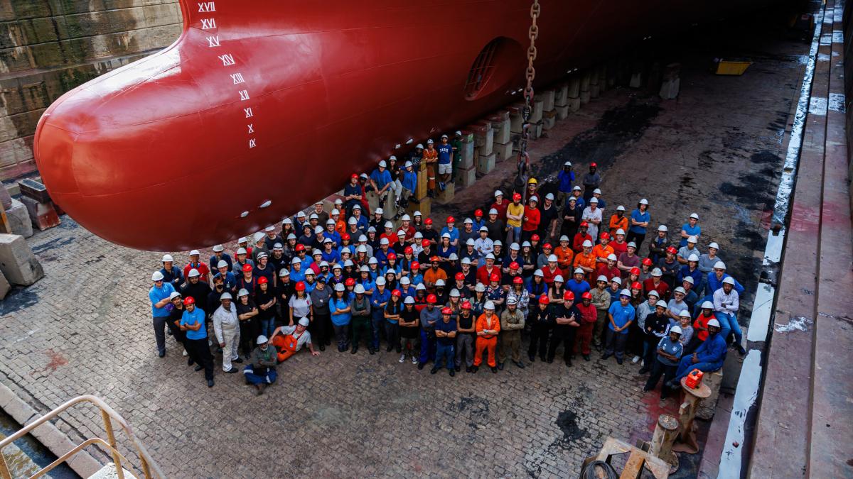 Seville, Spain :: Group photo of all of the annual maintenance workers in front of Logos Hope.